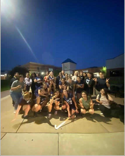 The Osbourn field hockey team as they celebrate a 1-0 win over Potomac.