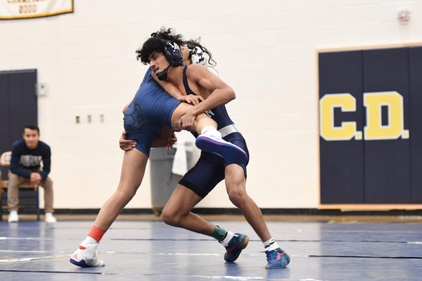 Navigation to Story: Wrestlers Hit The Mats, Focus On Form and Fundamentals